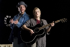 Elizabeth R. Wood as Ben Affleck and Nicole Perrone as Matt Damon